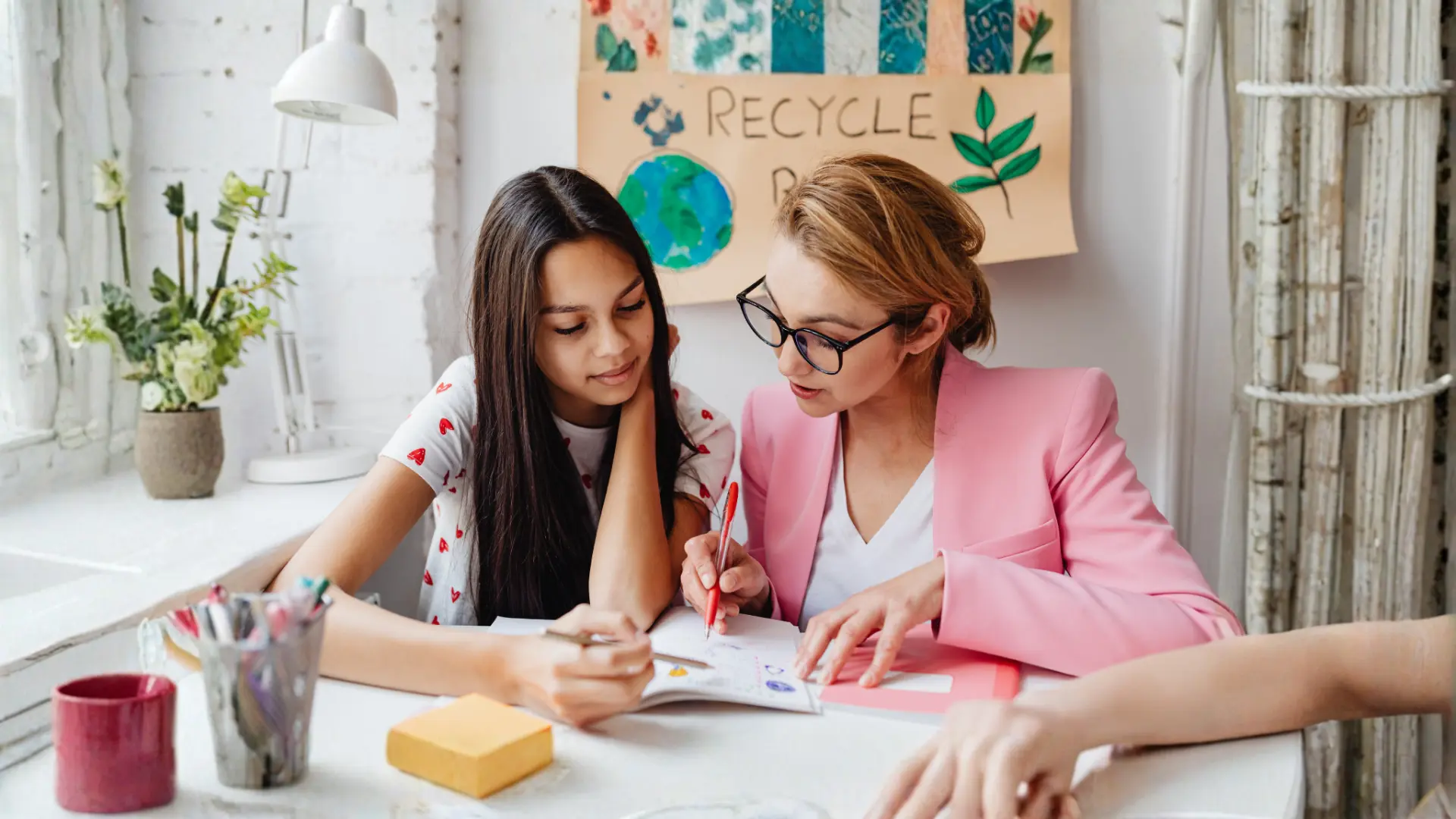 Women sitting together, sharing ideas and learning